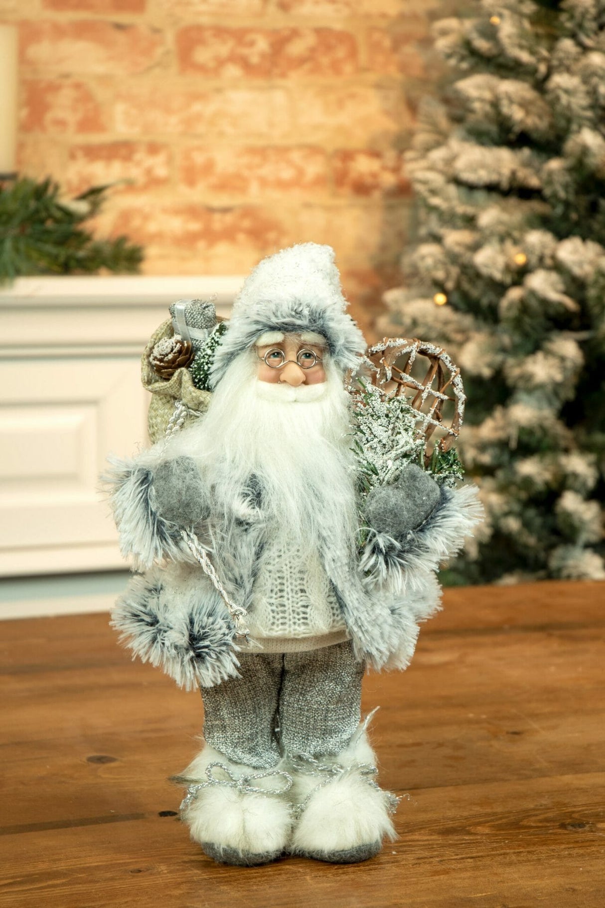 12" White and Gray Cloth Festive Santa Figurine with Snowshoes