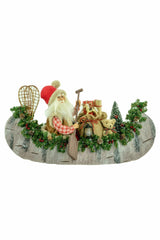 24" Red and Green Cardboard Canoeing Santa Figurine with Gift Sack