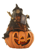 26" Sitting Flocked Orange and Black Polyfoam Vogue Witch Figure Sitting On A Pumpkin